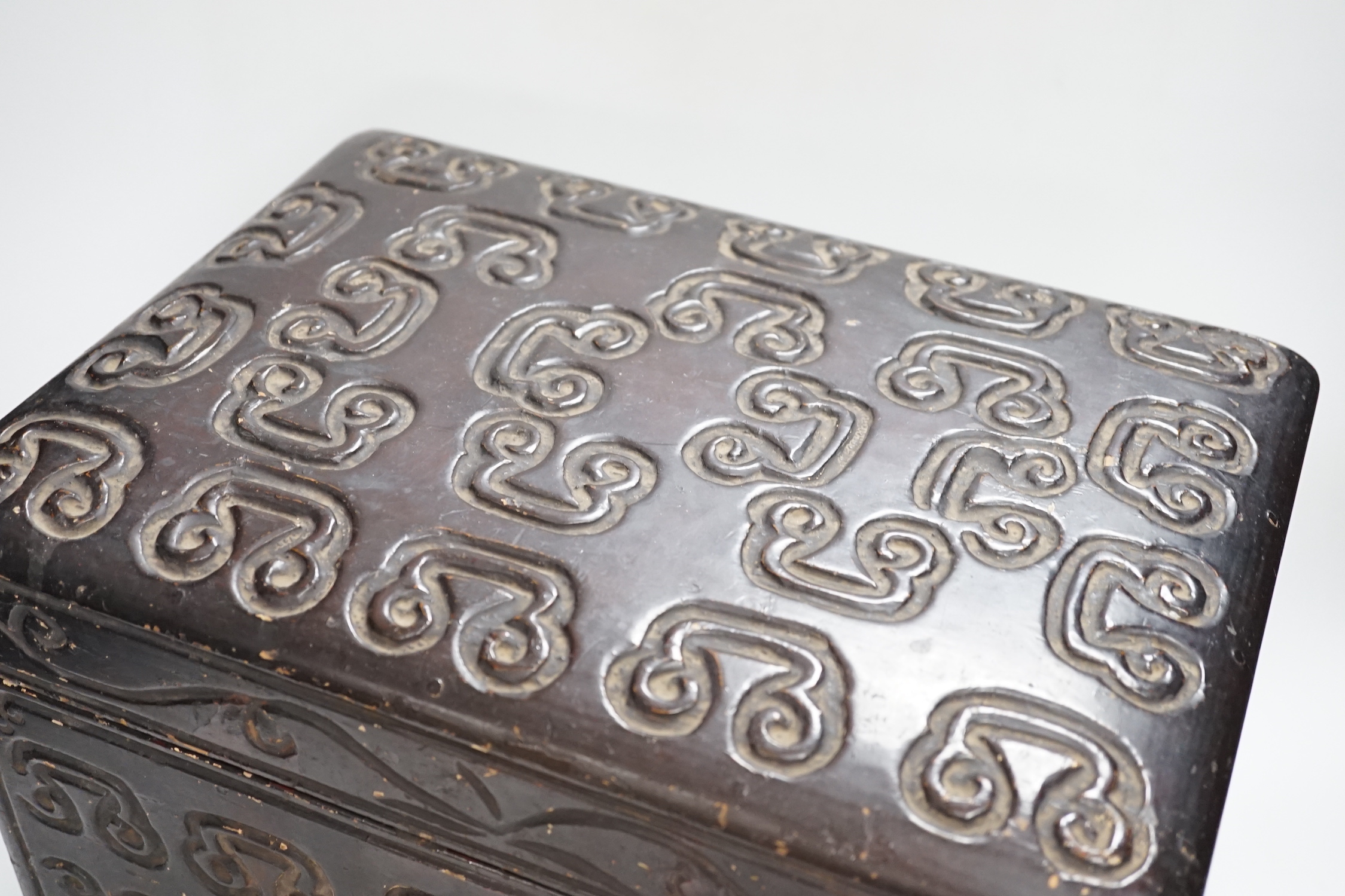 A Chinese tixi style lacquer box, 36cm wide, 26cm high